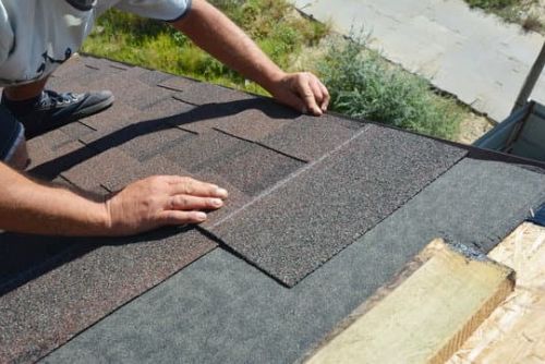 Applying Adhesives To The Shingles